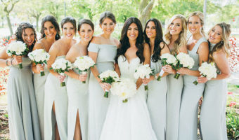 wedding portrait of bride with bridesmaids in mix and match dresses bridesmaid proposal