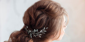 a bride wearing an elegant wedding hair accessory