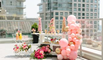 beautiful girly bridal shower with pink balloon arches, roof top bridal shower