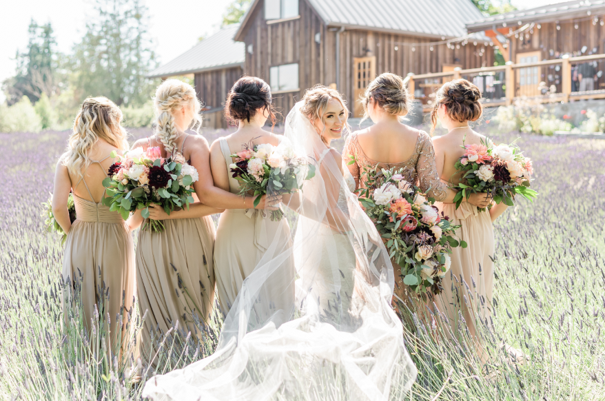 bride and bridemaids in a field of lavender for aromatherapy