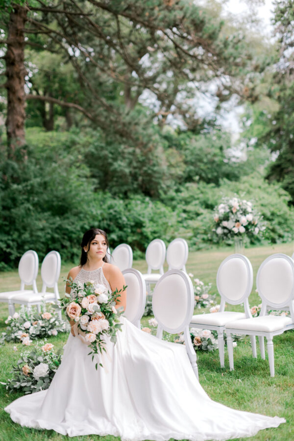 bride with bouquet outdoor wedding