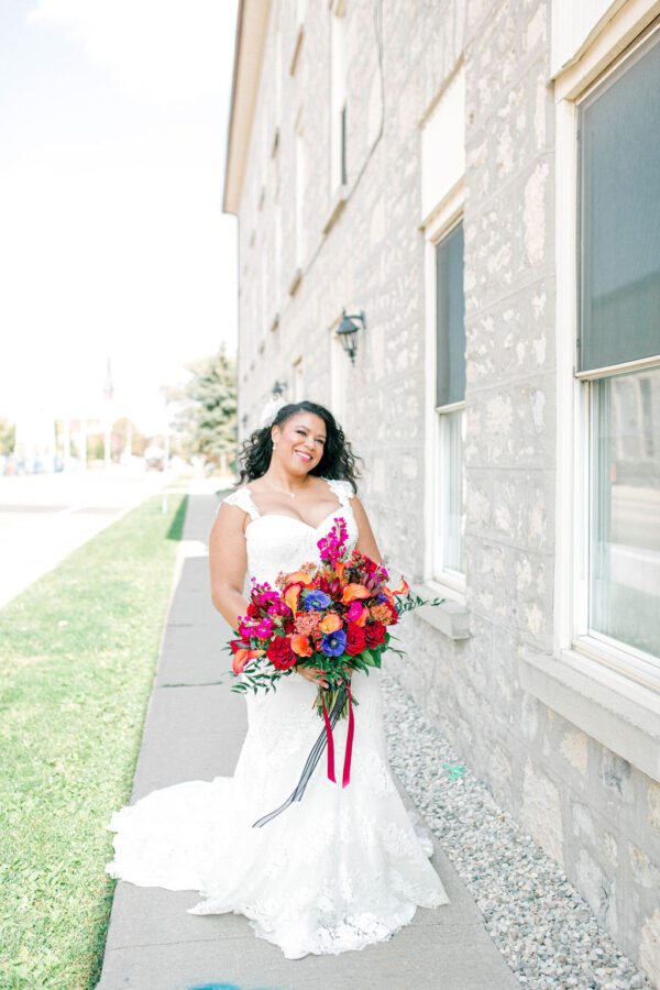 bride with a colourful bouquet