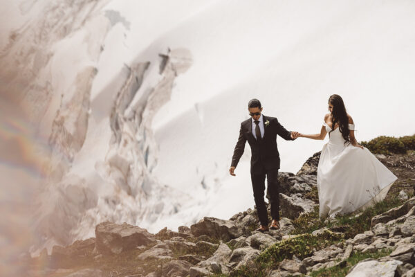 bride and groom in mountains