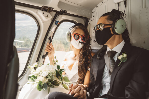 bride and groom in the helicopter