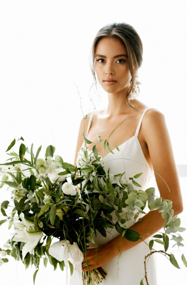 green wedding bride with flowers