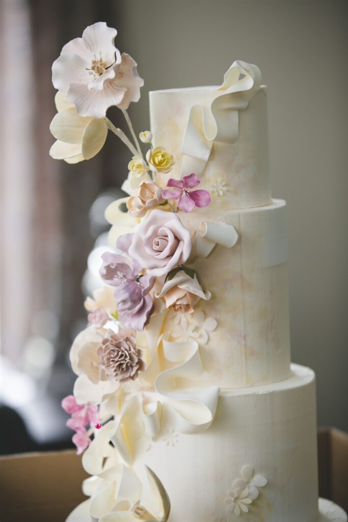 luxury wedding cake with handmade flowers