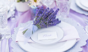 Sprigs of lavender on wedding dinner plate for aromatherapy
