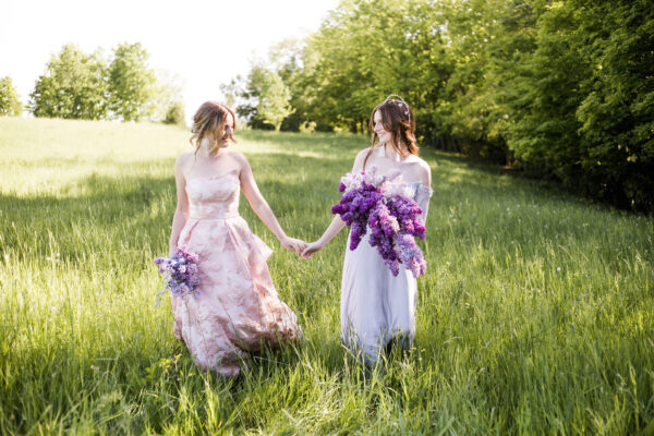 bride and her sister violet flowers