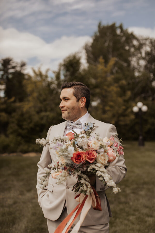 wedding groom with flowers