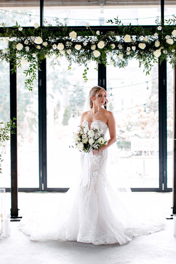 white wedding bride with flowers