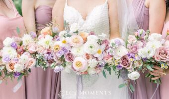 wedding and bridesmaids with flowers