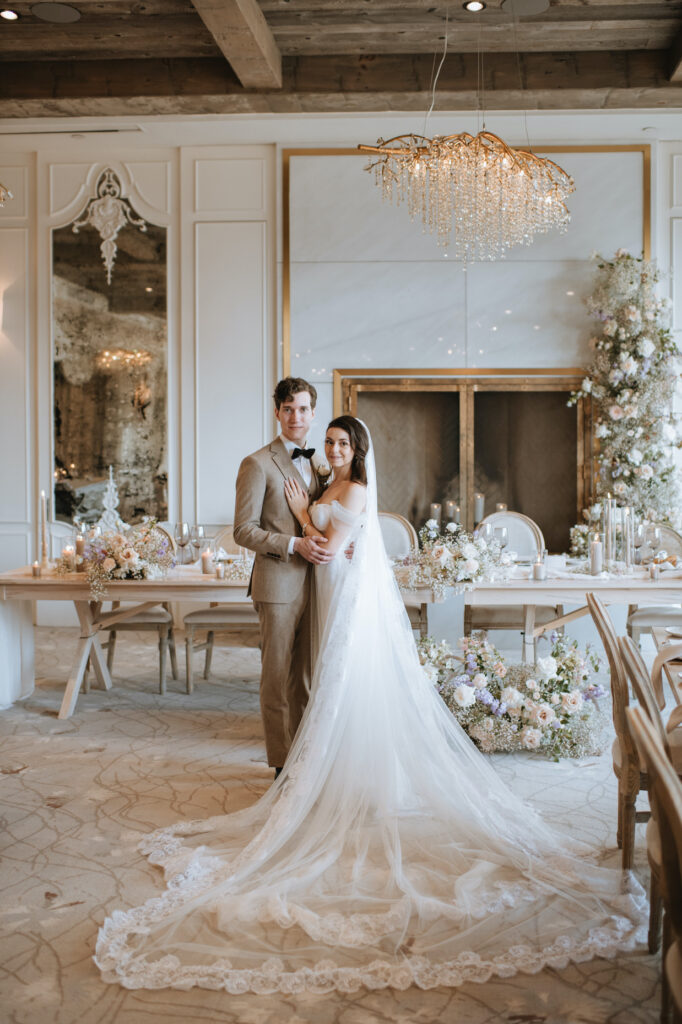 bride and groom pose for traditional wedding photography styles