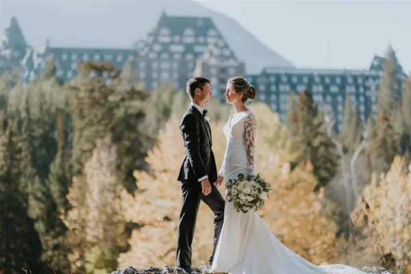 bride and groom portrait with Banff Springs Hotel in the background