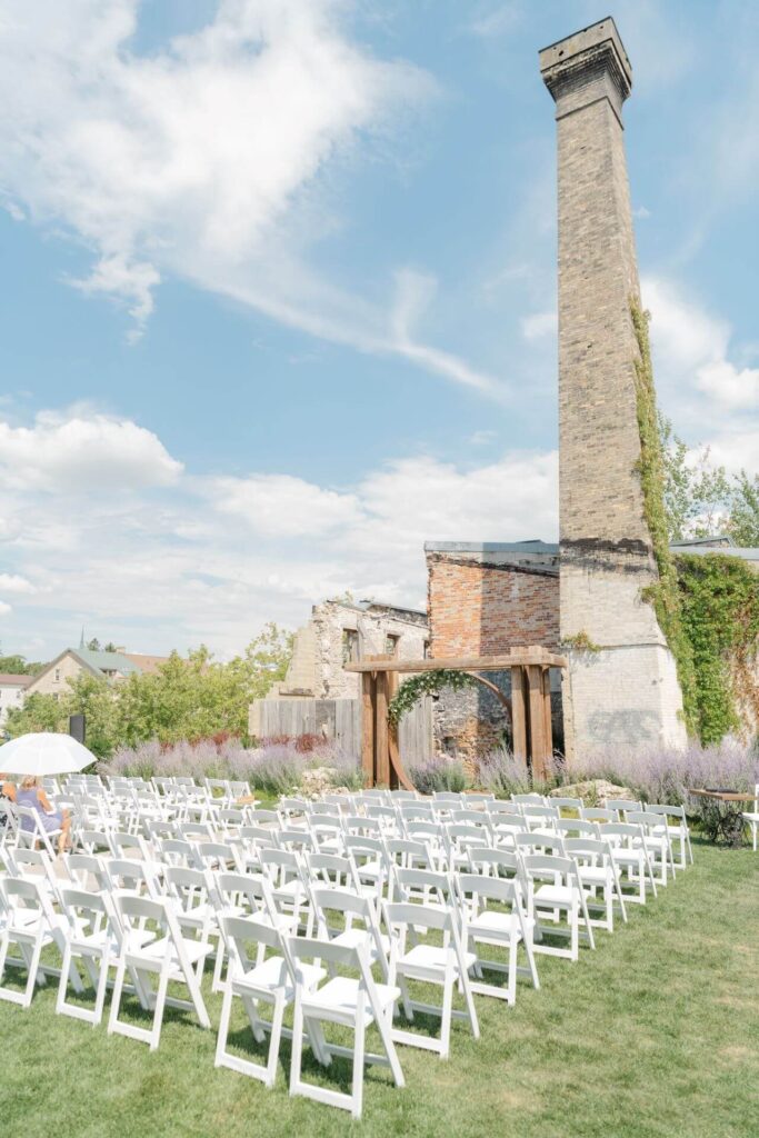 Gorgeous outdoor wedding ceremony at Elora Mill Hotel in Ontario