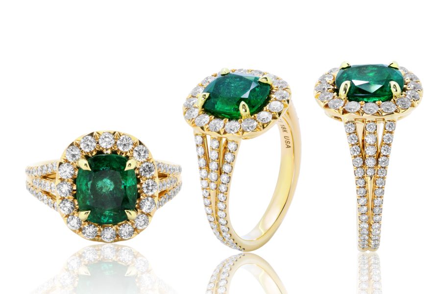 photo of 3 round emerald engagement rings with diamonds 