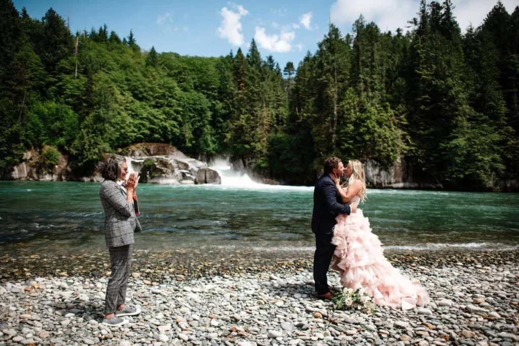 Bride and groom saying I Do at Nimmo Bay Wilderness Resort