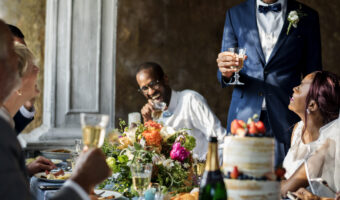 Groom giving funny speech at wedding