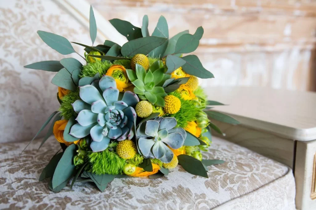 Navy and yellow wedding bouquet with succulents
