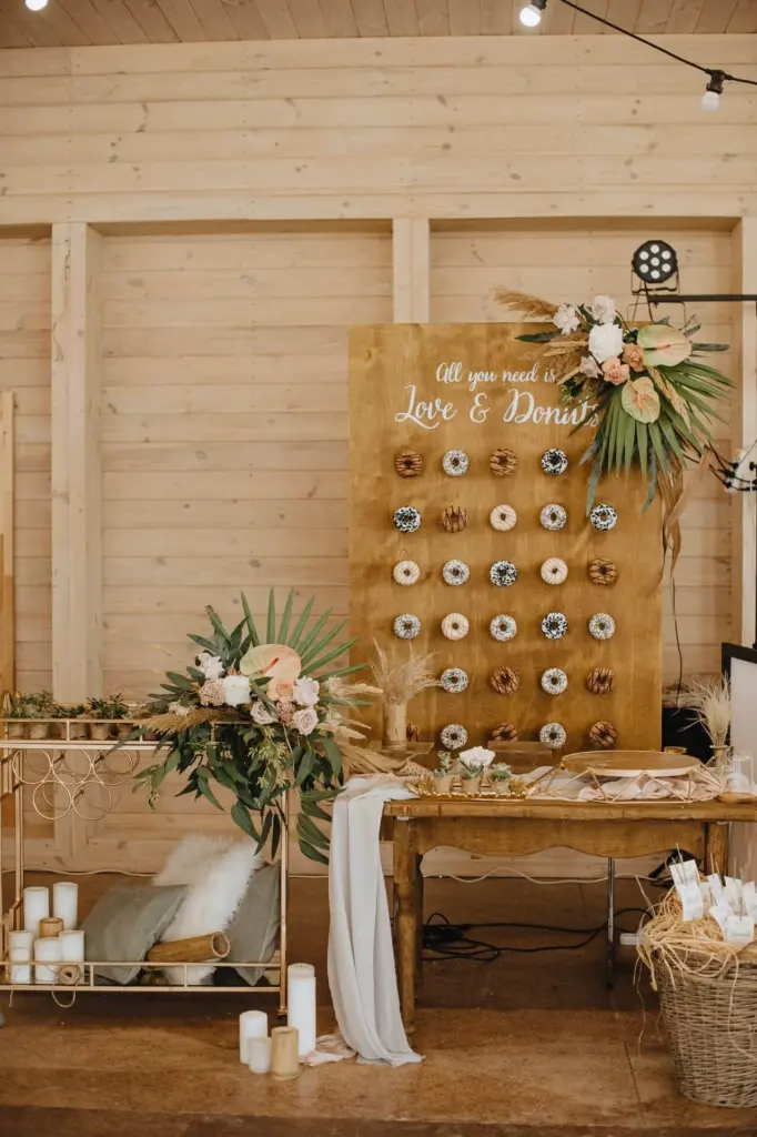beautiful boho wedding display with donut wall