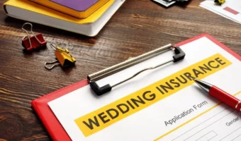 wedding planning table with wedding insurance forms