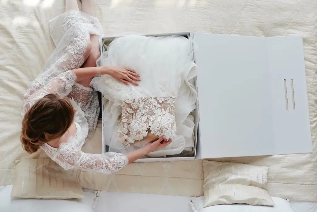 post-wedding checklist put wedding dress in preservation box