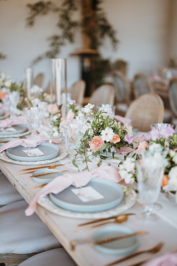 table adorned with pink and white flowers