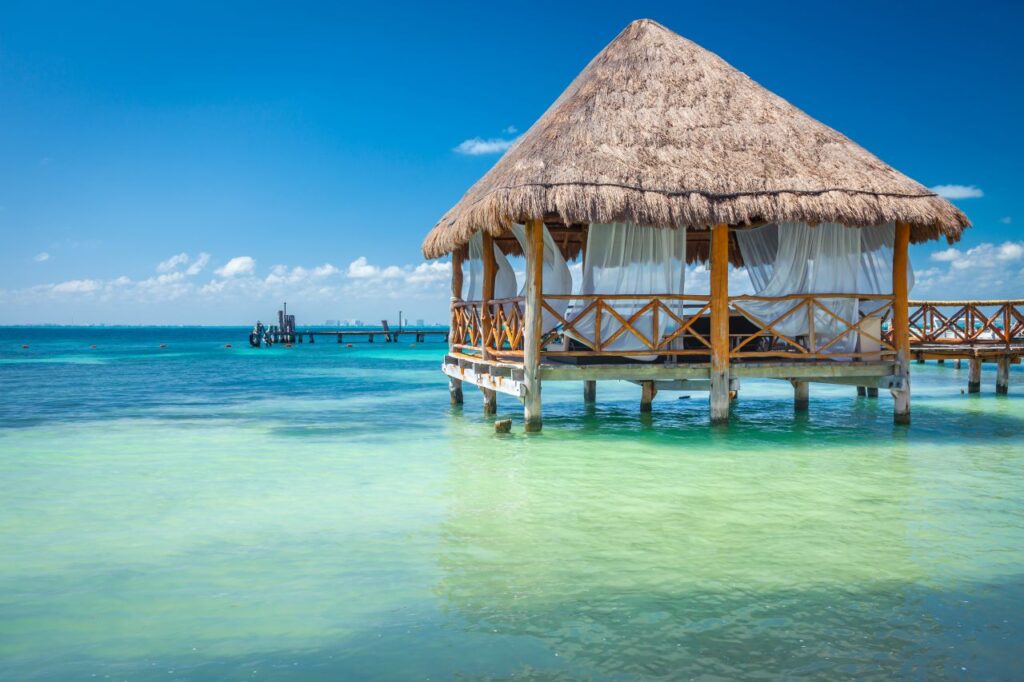 breathtaking over the water tiki hut for honeymoon in the Caribbean