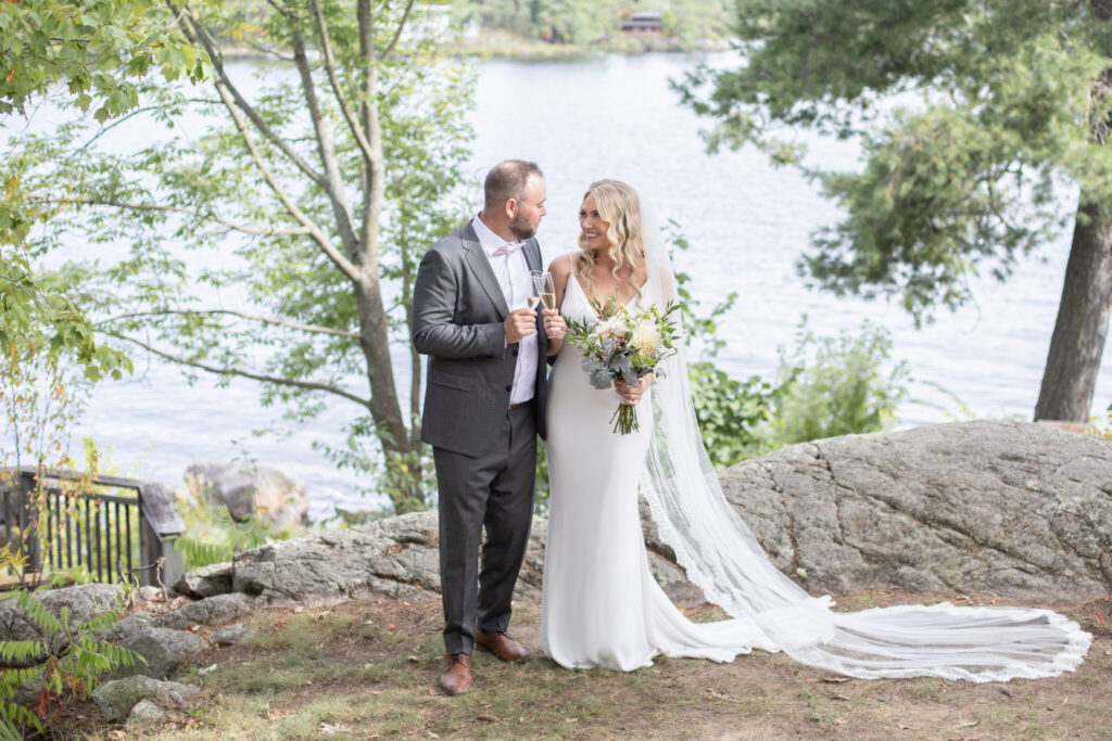 Stefanie and Alex wedding at Viamede Resort, Stony Lake portrait of bride and groom looking at lake