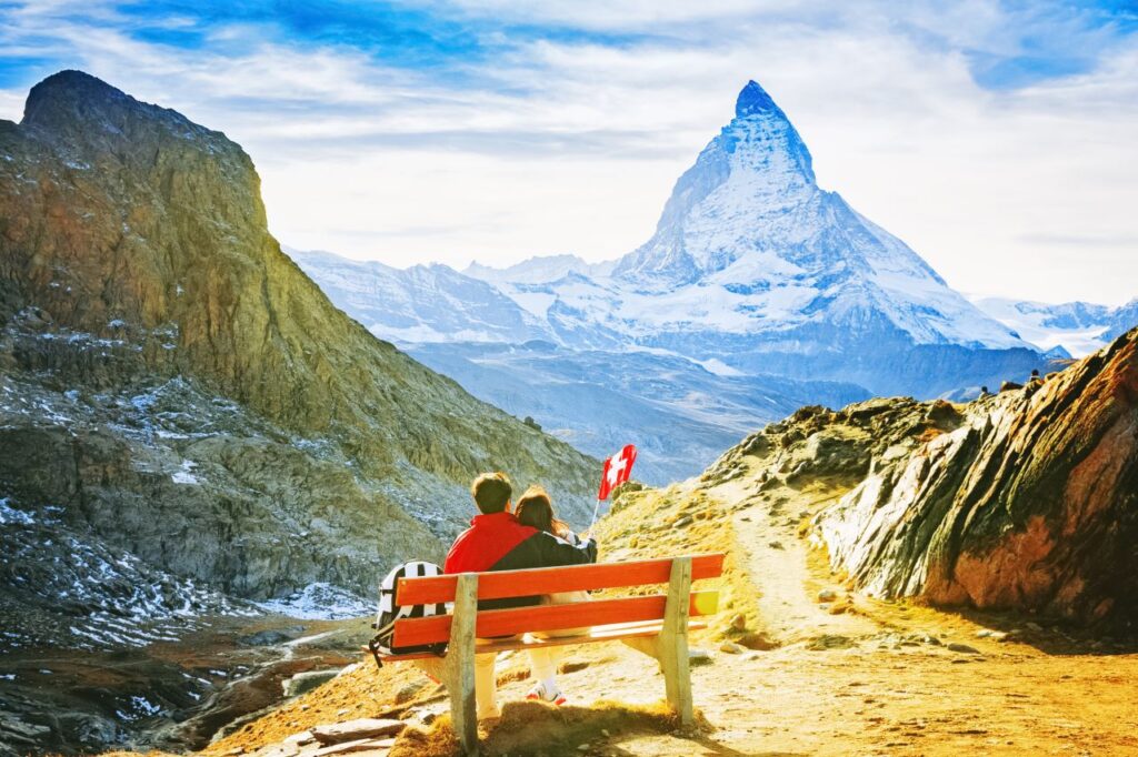 active honeymoon location couple hikes in Swiss Alps