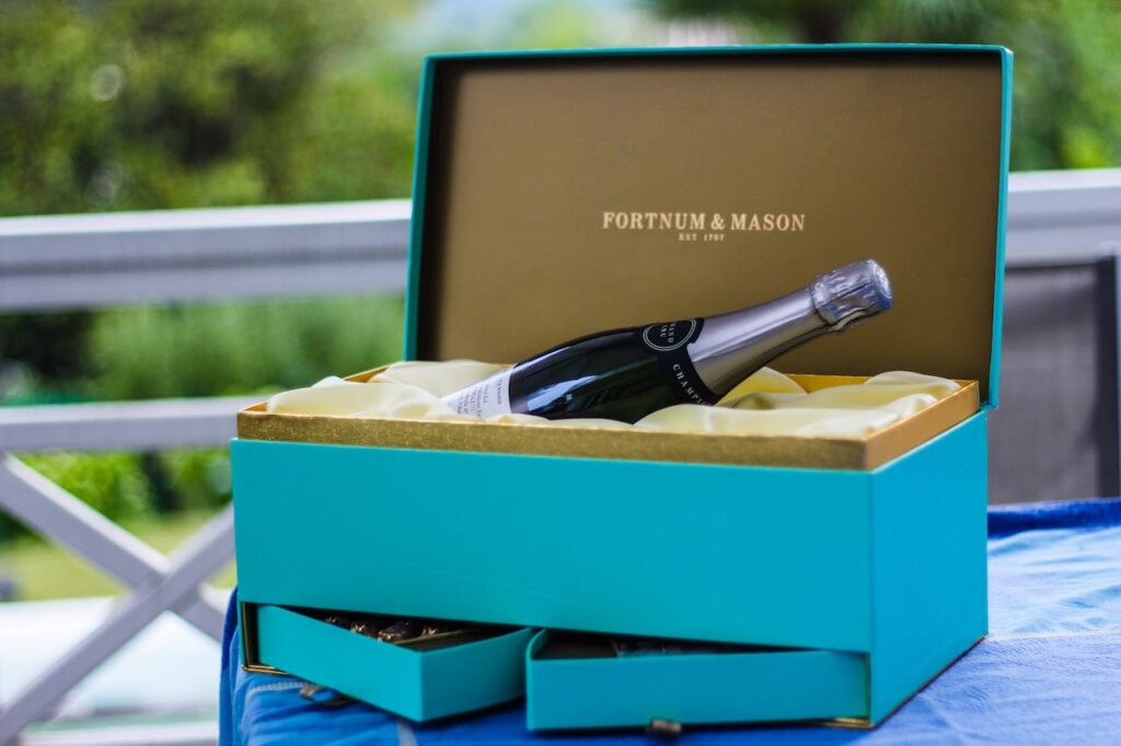 wedding gift turquoise box of Portman and Mason champagne