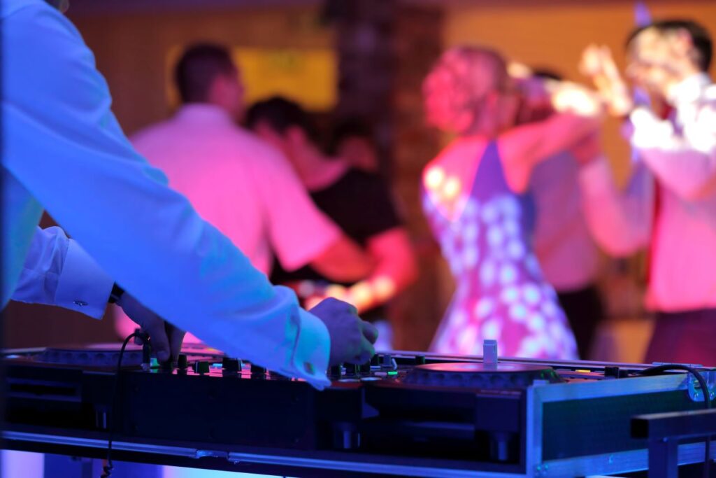 wedding DJ spins tunes while everyone hits the dancefloor