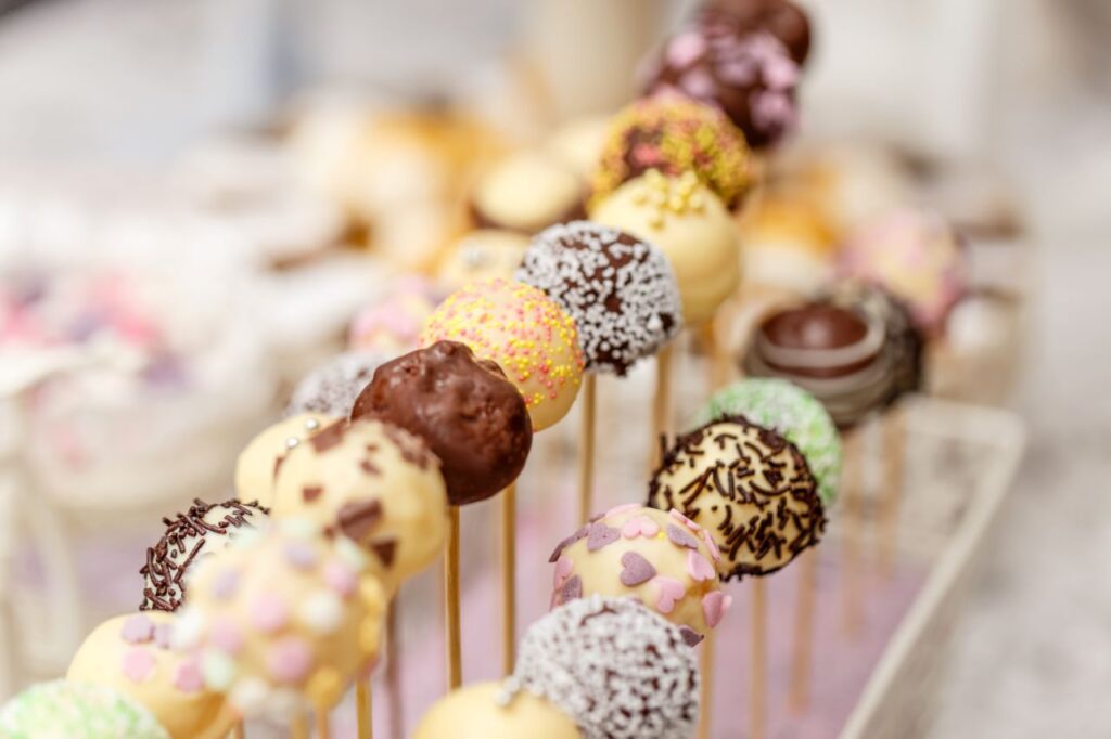 wedding cakes don't have to have tiers, photo of wedding cake pops on tray