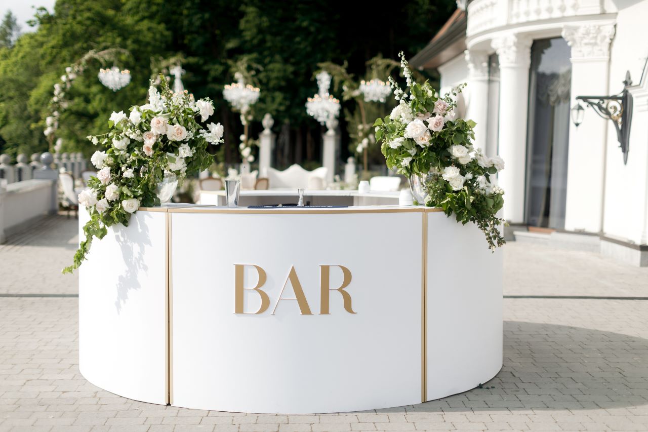 open bars at weddings white and gold outside on veranda