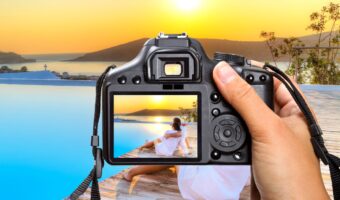 picture of image preview screen on camera with couple looking at view of Greece honeymoon photographer