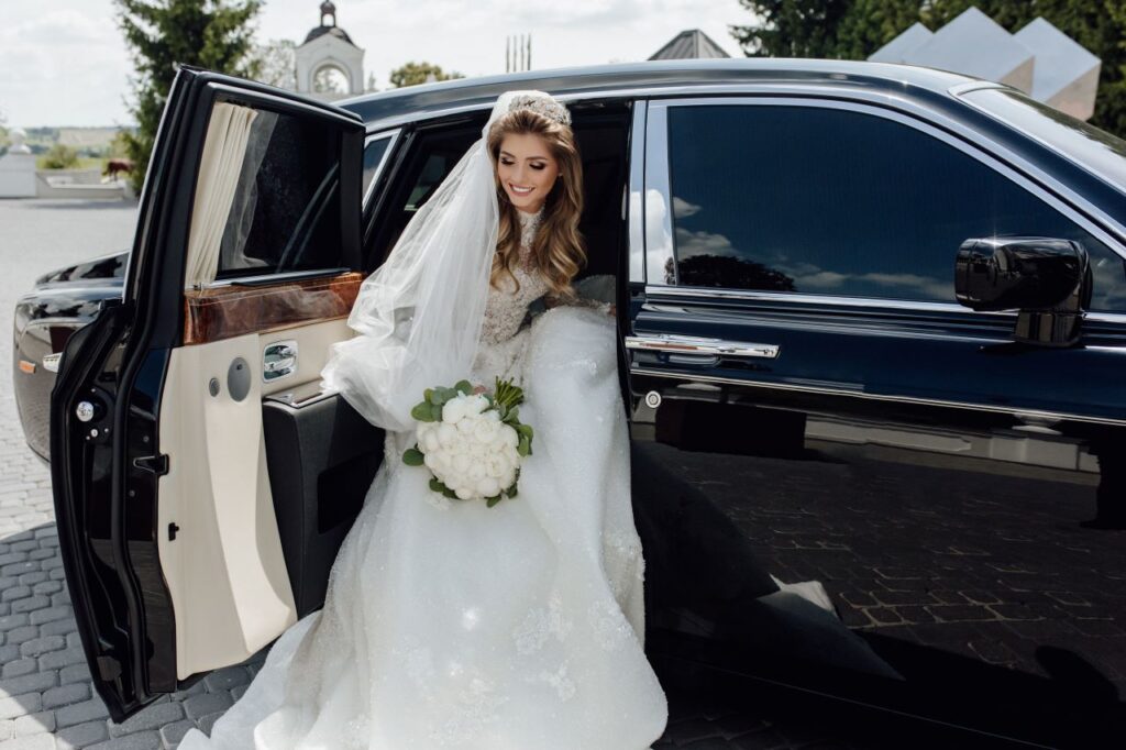 black wedding limos for brides arriving to the ceremony