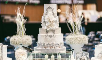 wedding cake trends with pearls and luxury wedding crest in ornate silver