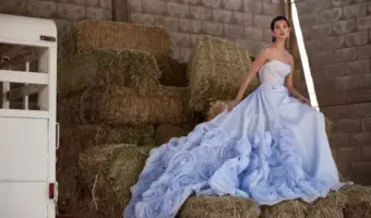 nadiamanjarrez blue wedding dress with floral rosettes