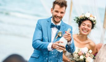 groom destination wedding trends colourful suits