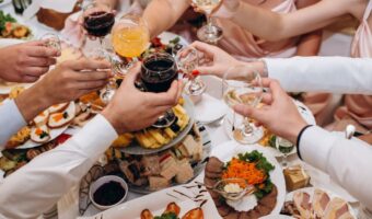 guests at table enjoying a deliecious wedding menu