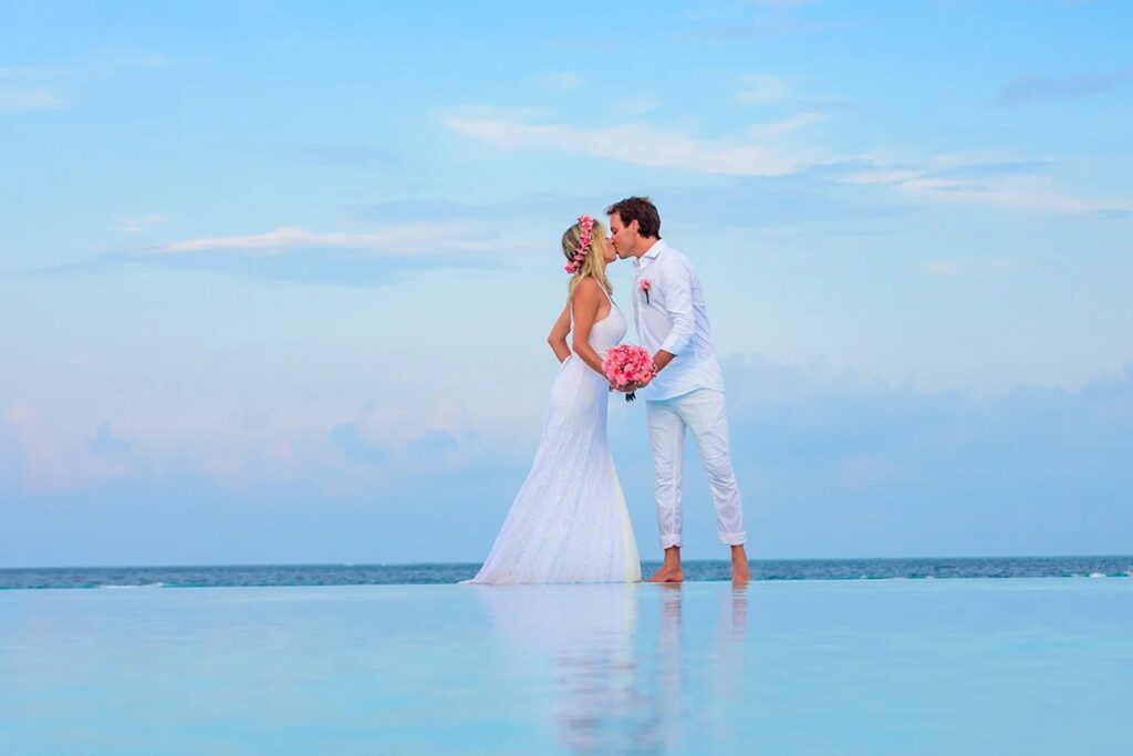 bride and groom kissing Turks and Caicos image for Today's Destination Weddings & Honeymoons website