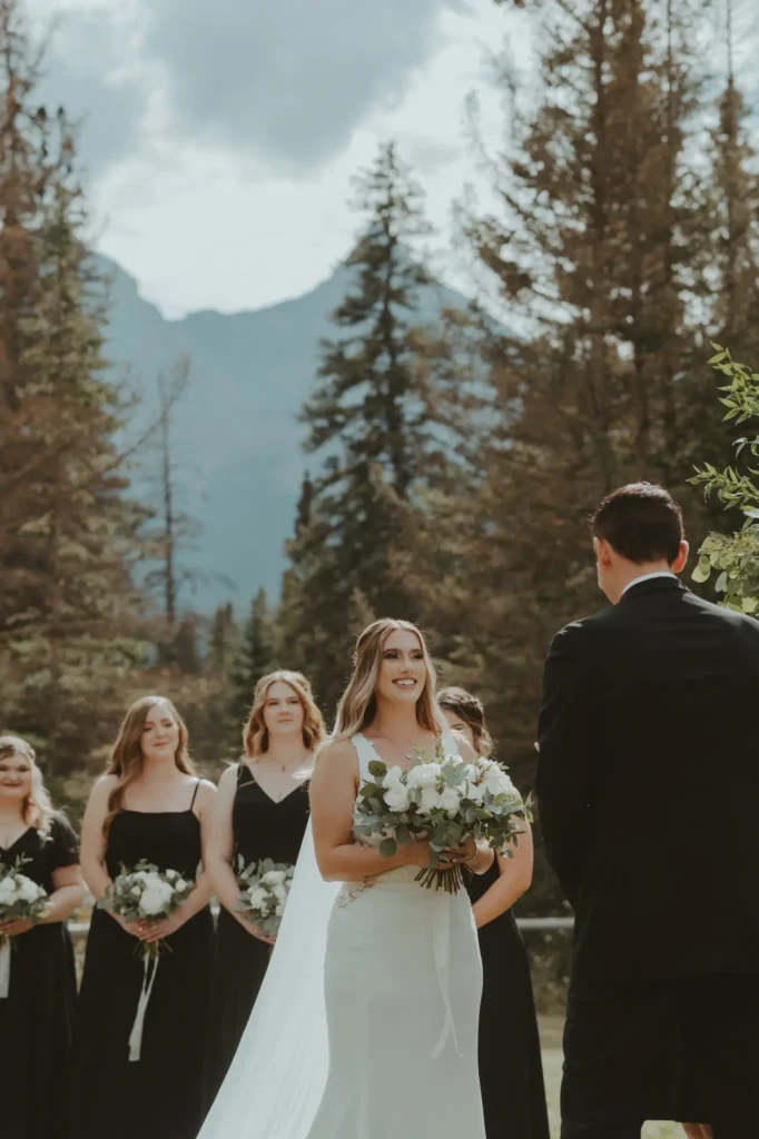 A beautiful wedding ceremony in Banff, set against stunning mountain scenery.