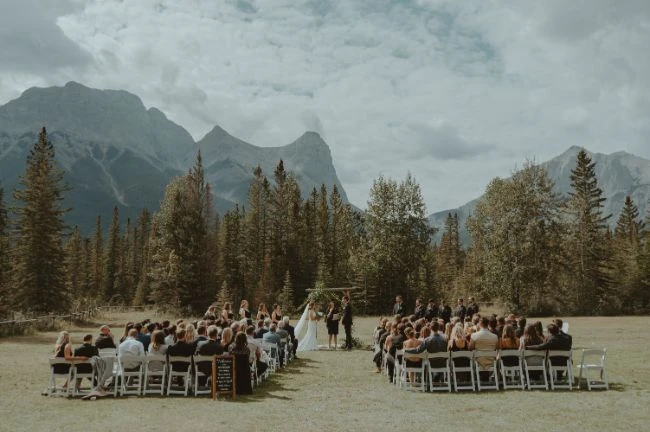 A beautiful wedding ceremony in Banff, showcasing a couple in love, with breathtaking backdrop.