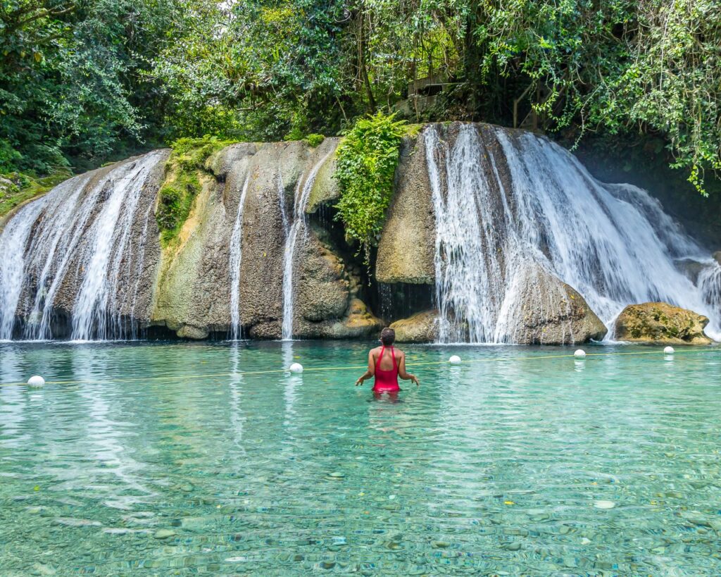 Woman admiring Reach Falls on Jamaica honeymoon