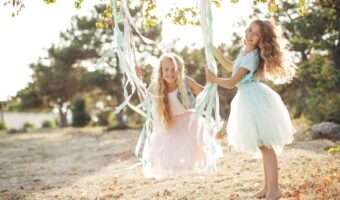 a great way to entertain kids at weddings set up a beachside swing