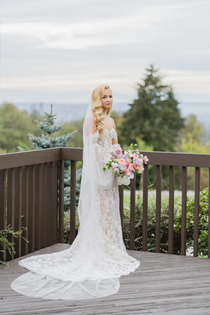 stunning bride outside with mountain view during styled shoot