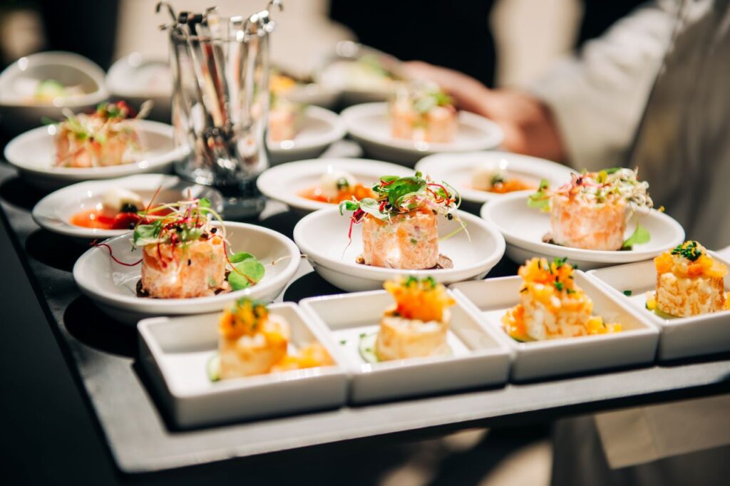 wedding caterer Salmon tatrare in small plates, catering event, banquet food