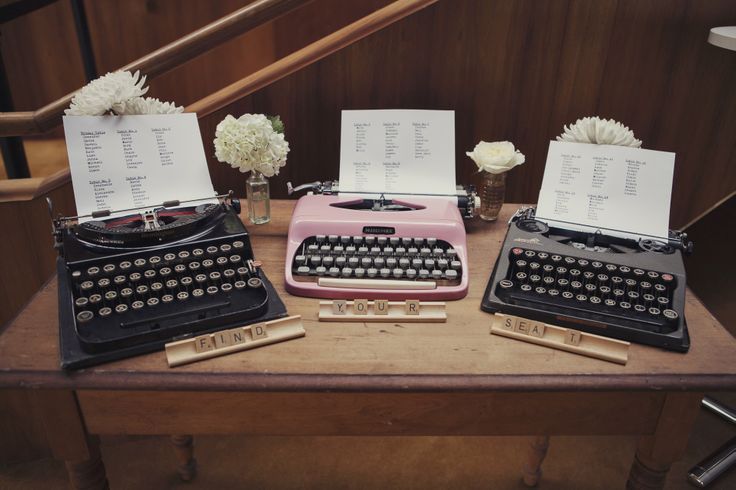 vintage wedding seating chart idea - vintage typewriters on table