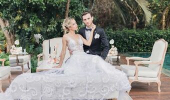 beautiful bride sitting with groom in Riviera Maya at destination wedding