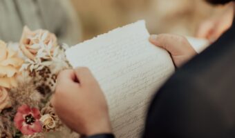 man doing wedding ceremony reading