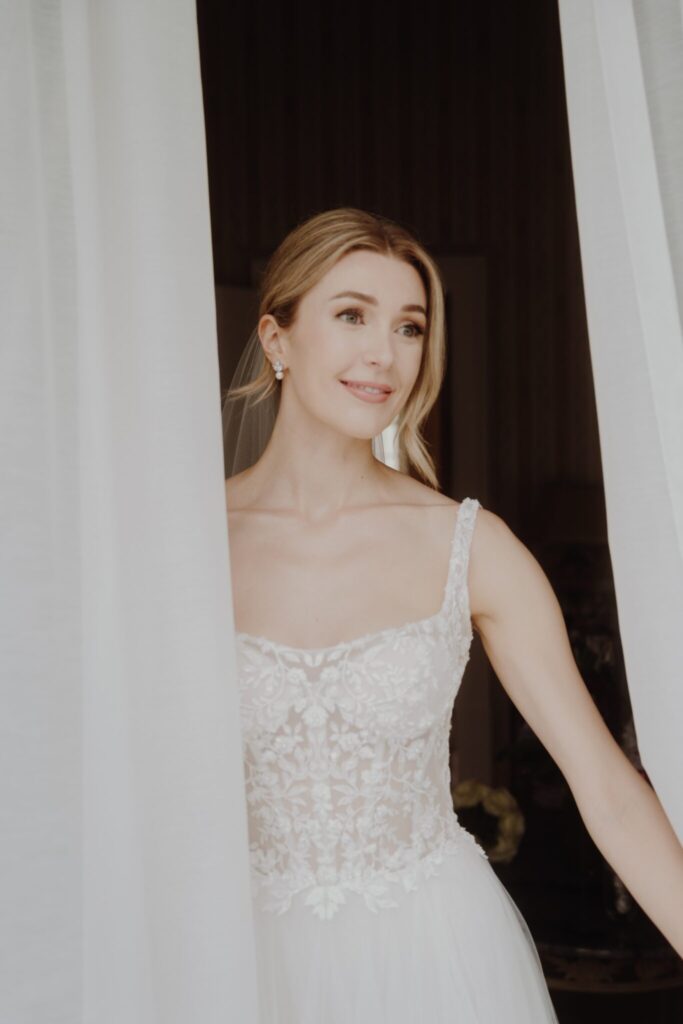 gorgeous bridal portrait at door in Portugal’s Valverde Sintra Palácio de Seteais, a five-star hotel set in the mountainside of Sintra a stunning palace wedding